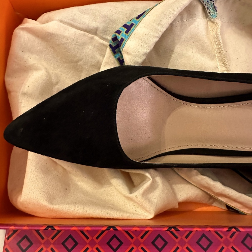 Very reliable and practical black Tory Burch heel